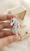 Horse brooch